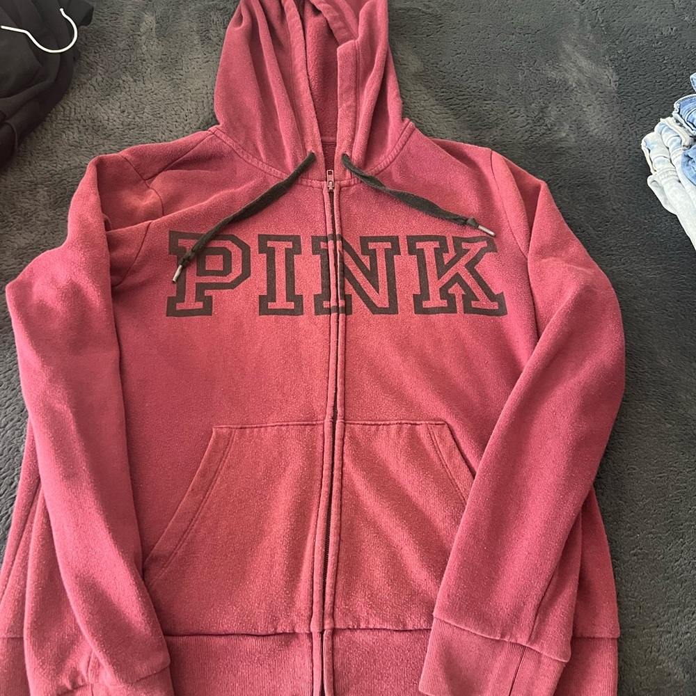 Pink sweater like a purple ish color